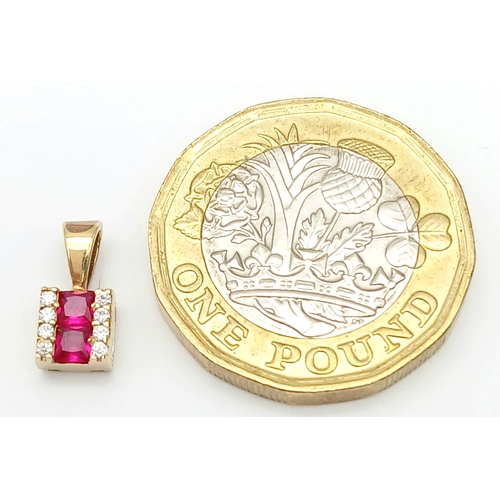 946 - A 9K YELLOW GOLD STONE SET PENDANT 0.5G. Ref: TAN 7009