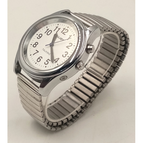 953 - A MAUJOY TALKING WATCH IN FULL WORKING ORDER WITH EXPANDING BRACELET. TELLS TIME, DATE AND HAS AN AL... 