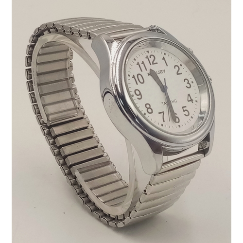 953 - A MAUJOY TALKING WATCH IN FULL WORKING ORDER WITH EXPANDING BRACELET. TELLS TIME, DATE AND HAS AN AL... 