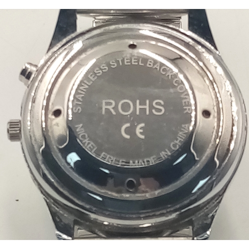 953 - A MAUJOY TALKING WATCH IN FULL WORKING ORDER WITH EXPANDING BRACELET. TELLS TIME, DATE AND HAS AN AL... 