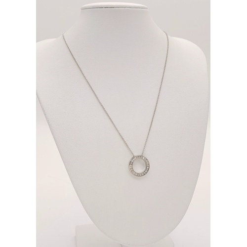 117 - An 18K WHITE GOLD DIAMOND SET ROUND PENDANT ON DISSAPEARING NECKLACE 4G. Ref: SC 7068