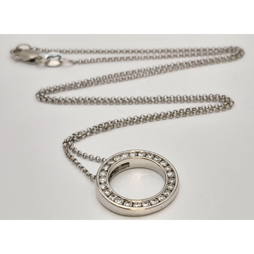 117 - An 18K WHITE GOLD DIAMOND SET ROUND PENDANT ON DISSAPEARING NECKLACE 4G. Ref: SC 7068
