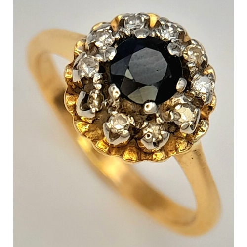 138 - An 18K YELLOW GOLD DIAMOND AND SAPPHIRE RING. 3.7G SIZE J. Ref: SC 7074