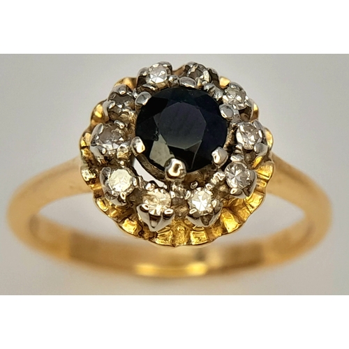 138 - An 18K YELLOW GOLD DIAMOND AND SAPPHIRE RING. 3.7G SIZE J. Ref: SC 7074