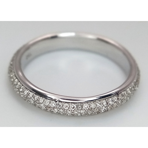 752 - An 18K White Gold Diamond Eternity Ring. Three row pave set diamonds. Size M. 3.13g total weight. MT... 