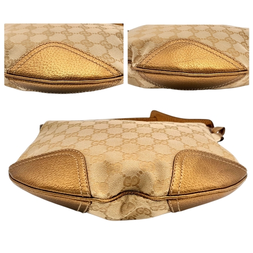 601 - A Gucci Monogram Princy Hobo Bag. Canvas exterior with metallic leather trim, single strap, silver-t... 