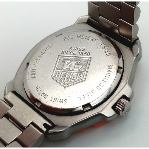 118 - A Tag Heuer Orange Bezel Quartz Gents Watch. Model 373-513. Stainless steel bracelet and case - 32mm... 