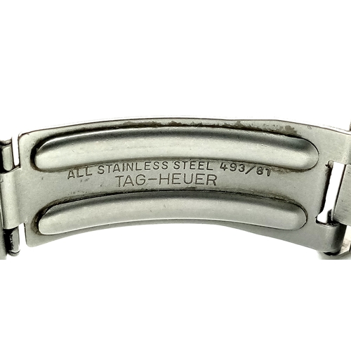 118 - A Tag Heuer Orange Bezel Quartz Gents Watch. Model 373-513. Stainless steel bracelet and case - 32mm... 