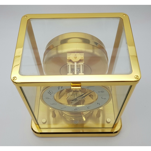 27 - A Beautiful Jaeger-LeCoultre Hermes Gilded Mantle Clock. Atmospheric clock with white openwork dial ... 