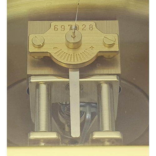 27 - A Beautiful Jaeger-LeCoultre Hermes Gilded Mantle Clock. Atmospheric clock with white openwork dial ... 