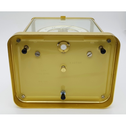 27 - A Beautiful Jaeger-LeCoultre Hermes Gilded Mantle Clock. Atmospheric clock with white openwork dial ... 