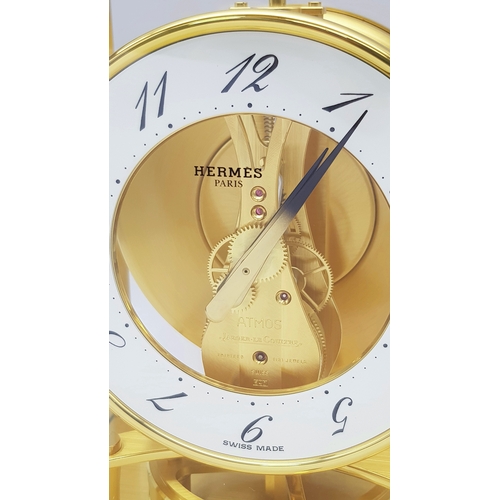 27 - A Beautiful Jaeger-LeCoultre Hermes Gilded Mantle Clock. Atmospheric clock with white openwork dial ... 