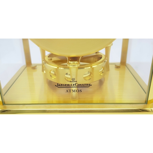 27 - A Beautiful Jaeger-LeCoultre Hermes Gilded Mantle Clock. Atmospheric clock with white openwork dial ... 