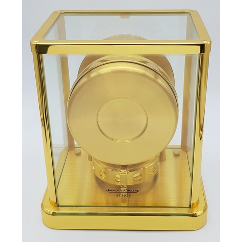 27 - A Beautiful Jaeger-LeCoultre Hermes Gilded Mantle Clock. Atmospheric clock with white openwork dial ... 