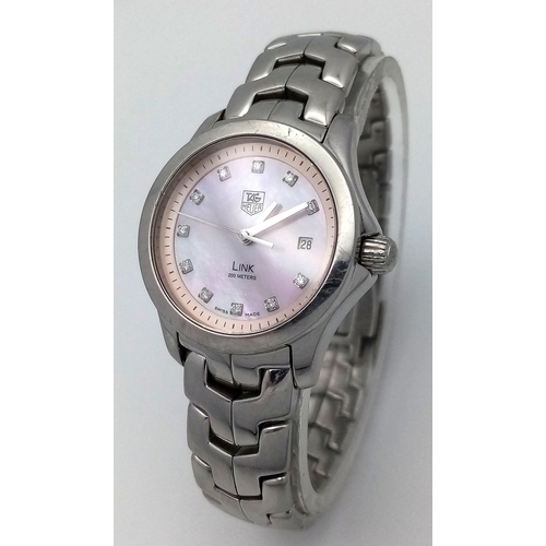 34 - A Tag Heuer Link Mother of Pearl Ladies Quartz Watch. Model - WJFT31B. Stainless steel bracelet and ... 