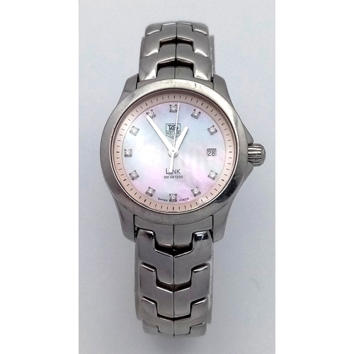 34 - A Tag Heuer Link Mother of Pearl Ladies Quartz Watch. Model - WJFT31B. Stainless steel bracelet and ... 