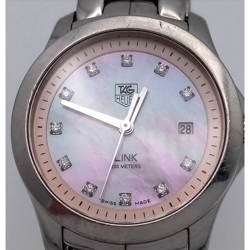 34 - A Tag Heuer Link Mother of Pearl Ladies Quartz Watch. Model - WJFT31B. Stainless steel bracelet and ... 