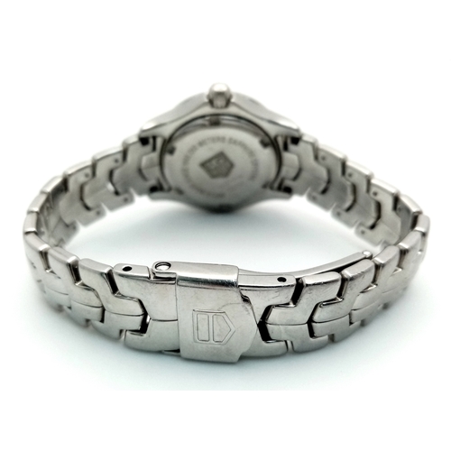 34 - A Tag Heuer Link Mother of Pearl Ladies Quartz Watch. Model - WJFT31B. Stainless steel bracelet and ... 