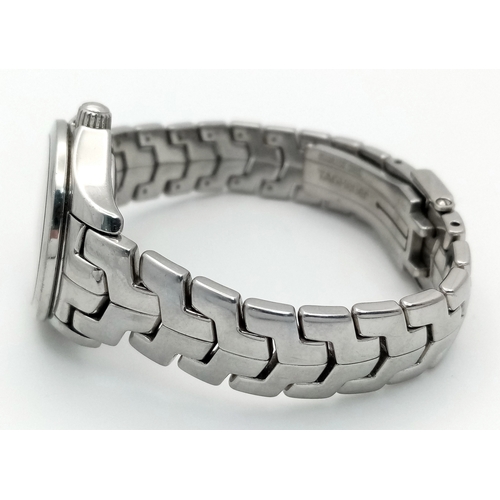 34 - A Tag Heuer Link Mother of Pearl Ladies Quartz Watch. Model - WJFT31B. Stainless steel bracelet and ... 
