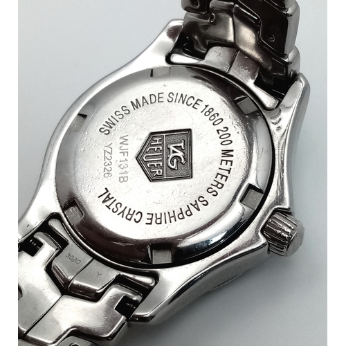 34 - A Tag Heuer Link Mother of Pearl Ladies Quartz Watch. Model - WJFT31B. Stainless steel bracelet and ... 