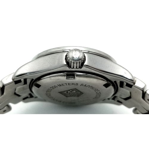 34 - A Tag Heuer Link Mother of Pearl Ladies Quartz Watch. Model - WJFT31B. Stainless steel bracelet and ... 