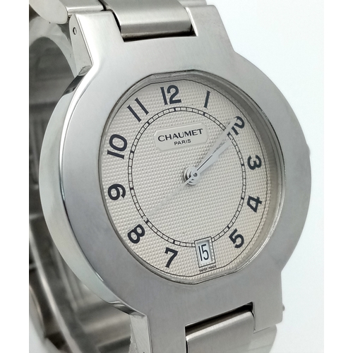 48 - A Chaumet of Paris Quartz Ladies Watch. Stainless steel bracelet and case - 36mm. White textured dia... 