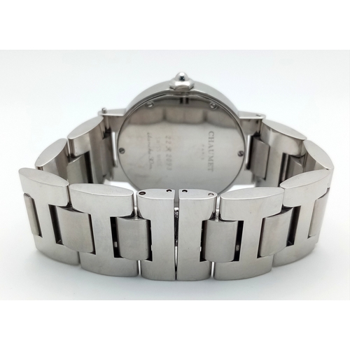 48 - A Chaumet of Paris Quartz Ladies Watch. Stainless steel bracelet and case - 36mm. White textured dia... 