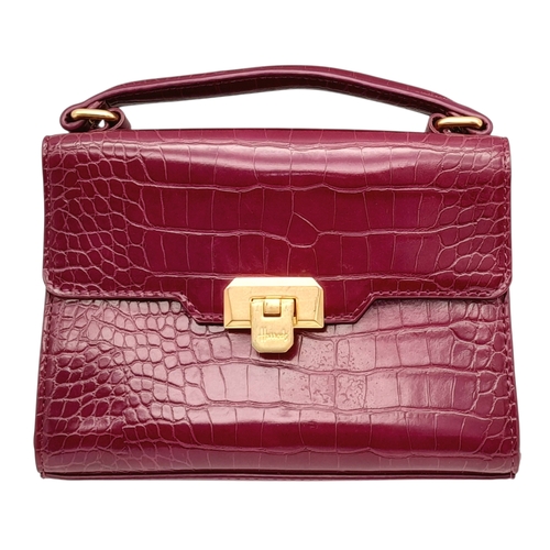 503 - A Harrods Purple Croc-Effect Shoulder Bag. Purple textile exterior with gold-toned hardware, single ... 