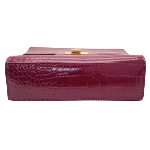 503 - A Harrods Purple Croc-Effect Shoulder Bag. Purple textile exterior with gold-toned hardware, single ... 