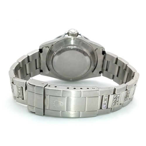 53 - A Custom Rolex Submariner Watch with Rainbow Gem-Set Bezel. Stainless steel diamond set bracelet and... 