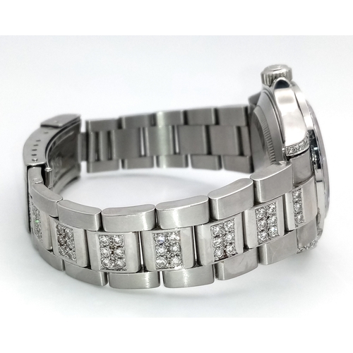 53 - A Custom Rolex Submariner Watch with Rainbow Gem-Set Bezel. Stainless steel diamond set bracelet and... 