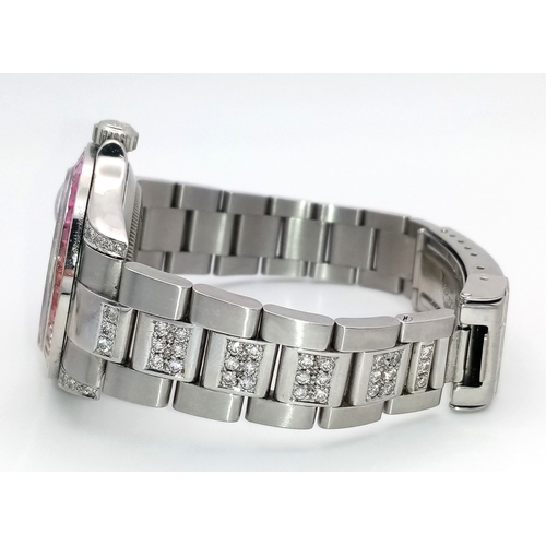 53 - A Custom Rolex Submariner Watch with Rainbow Gem-Set Bezel. Stainless steel diamond set bracelet and... 