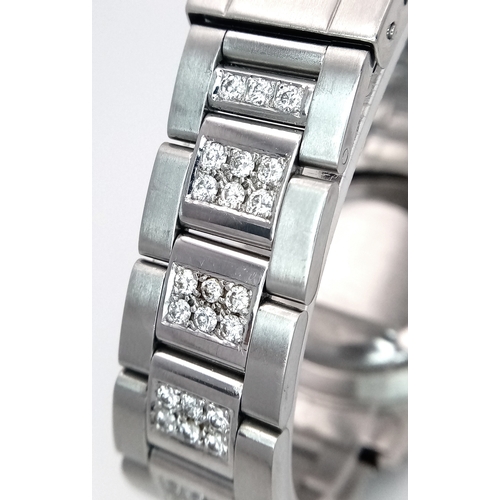 53 - A Custom Rolex Submariner Watch with Rainbow Gem-Set Bezel. Stainless steel diamond set bracelet and... 