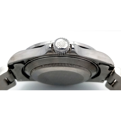 53 - A Custom Rolex Submariner Watch with Rainbow Gem-Set Bezel. Stainless steel diamond set bracelet and... 