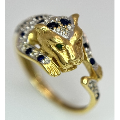 54 - An 18K YELLOW GOLD DIAMOND AND SAPPHIRE SET PANTHER RING. ONE STONE MISSING. 4.6G SIZE L. Ref: 9983