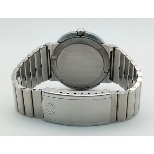 74 - A Vintage Omega Geneve Dynamic Automatic Day-Date Watch. Stainless steel bracelet and case - 42mm. T... 