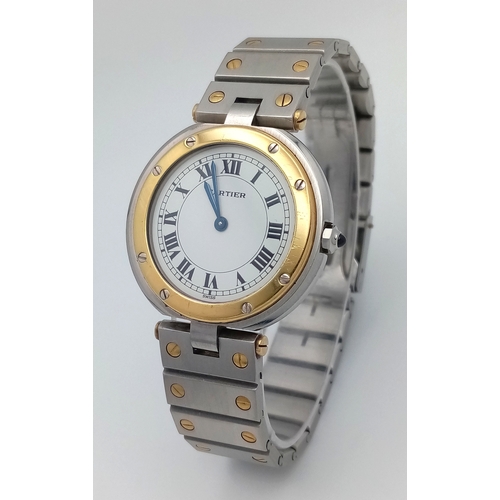 18 - A Cartier Santos Ronde Bi-Metal Ladies Quartz Watch. Stainless steel bracelet with gold accents. Sta... 
