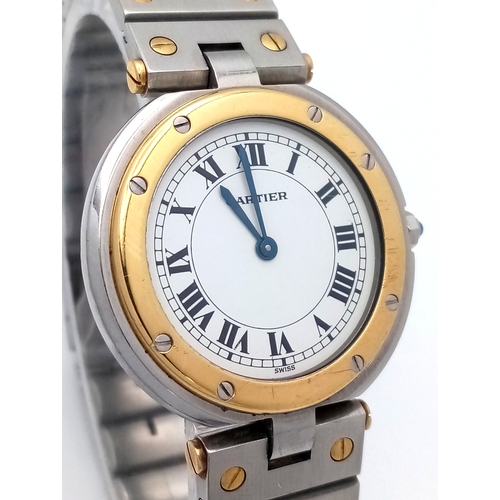 18 - A Cartier Santos Ronde Bi-Metal Ladies Quartz Watch. Stainless steel bracelet with gold accents. Sta... 