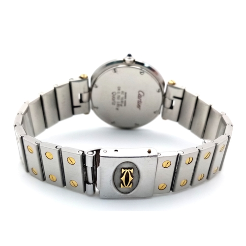 18 - A Cartier Santos Ronde Bi-Metal Ladies Quartz Watch. Stainless steel bracelet with gold accents. Sta... 