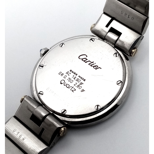 18 - A Cartier Santos Ronde Bi-Metal Ladies Quartz Watch. Stainless steel bracelet with gold accents. Sta... 