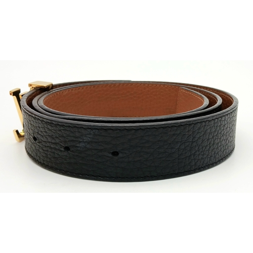 237 - A Louis Vuitton Black Leather LV Initials Belt. Some tiny stains to the leather but in very good con... 