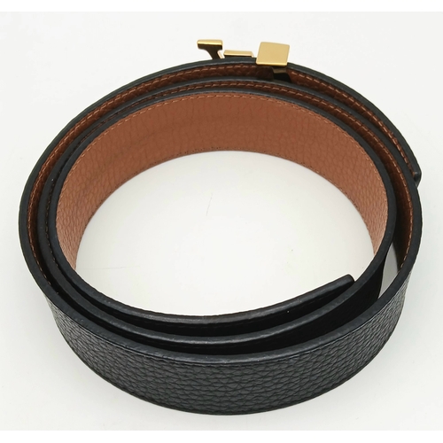 237 - A Louis Vuitton Black Leather LV Initials Belt. Some tiny stains to the leather but in very good con... 