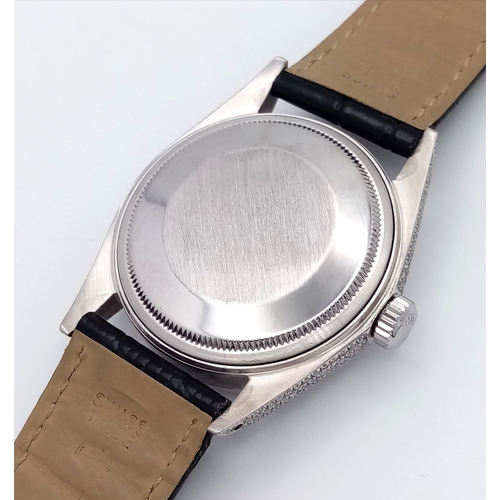 46 - A Rolex Oyster Perpetual Datejust Automatic Diamond Unisex Watch. Black leather strap. Stainless ste... 