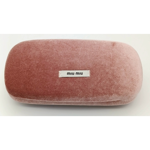 488 - A Pair of Miu Miu Designer Ladies Sunglasses. Comes with original box.  STK025780