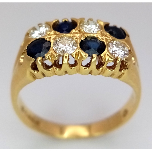 79 - AN 18K GOLD SAPPHIRE AND DIAMOND RING. (APPROX 0.5CTW (1CT TOTAL) OF SAPPHIRES AND DIAMONDS. RING. S... 