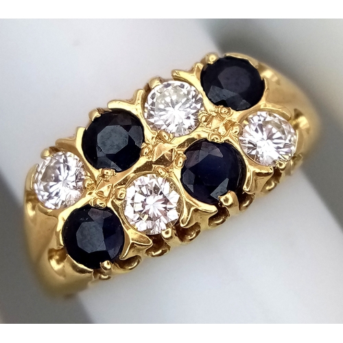 79 - AN 18K GOLD SAPPHIRE AND DIAMOND RING. (APPROX 0.5CTW (1CT TOTAL) OF SAPPHIRES AND DIAMONDS. RING. S... 