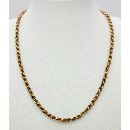 9 - A 9K GOLD ROPE TWIST NECKLACE CHAIN .   10.6gms    44cms