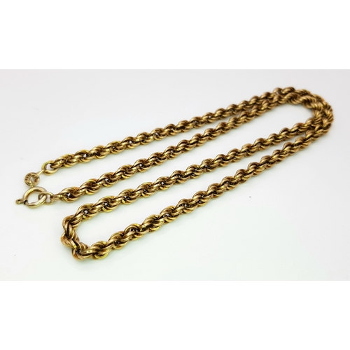 9 - A 9K GOLD ROPE TWIST NECKLACE CHAIN .   10.6gms    44cms