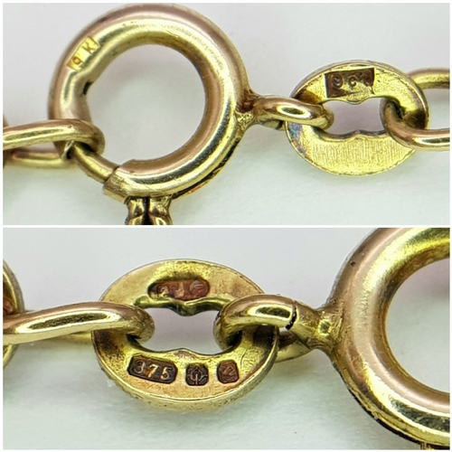 9 - A 9K GOLD ROPE TWIST NECKLACE CHAIN .   10.6gms    44cms