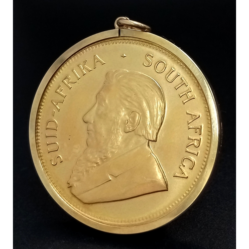 1 - A KRUGERRAND COIN DATED 1980  - 1 OZ OF FINE GOLD (22K) IN A 9K GOLD PENDANT SETTING. KRUGERRAND WEI... 